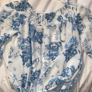 White with blue flowers blouse. Super cute for the spring and summer.